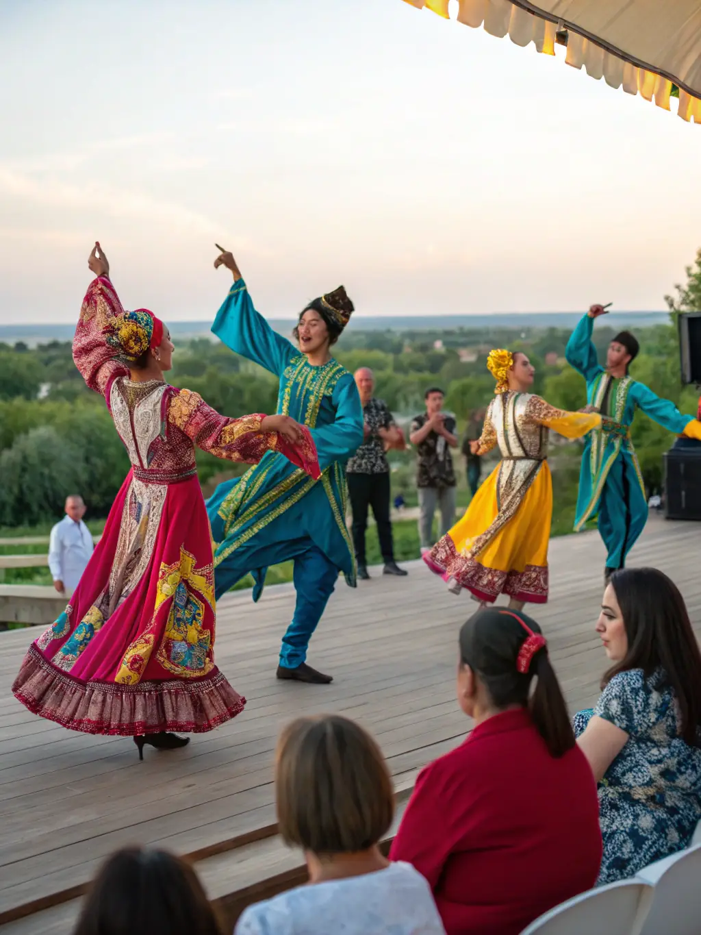 A photograph capturing a traditional dance performance during one of COMITE DES FETES DES HOGUES' cultural events, featuring dancers in traditional attire and a captivated audience.
